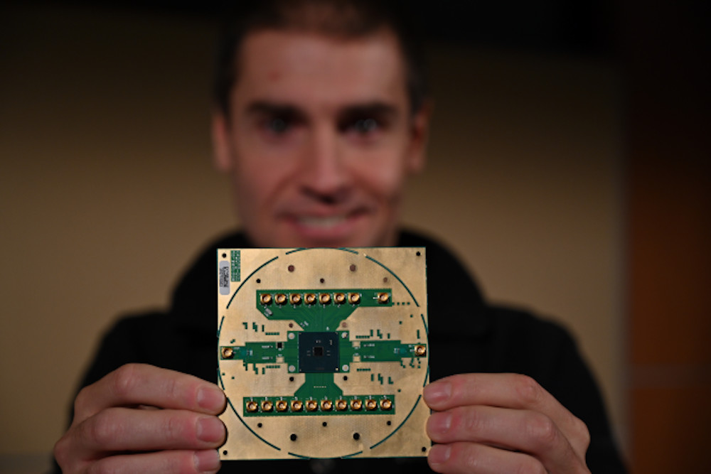 Stefano Pellerano, principal engineer at Intel Labs, holds Horse Ridge. The new cryogenic control chip will speed development of full-stack quantum computing systems, marking a milestone in the development of a commercially viable quantum computer. Image courtesy of Walden Kirsch/Intel Corporation.